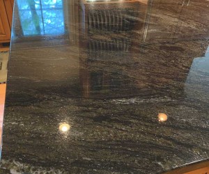 Dark granite kitchen countertop restoration